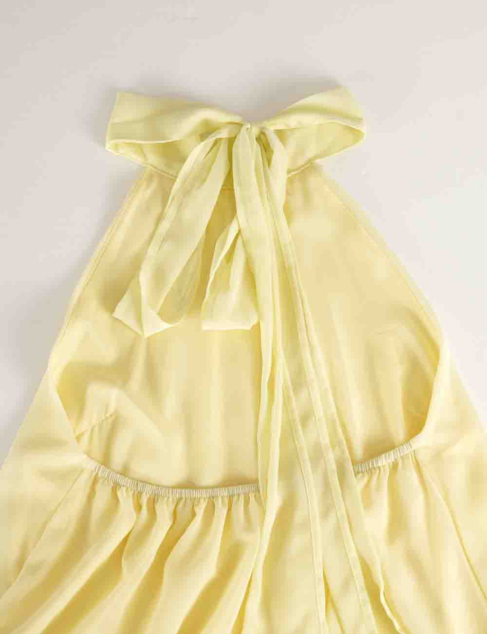 Ladies Chiffon Stand Neck Solid Color Ruffle Hem Sleeveless Top