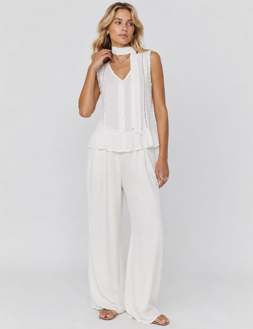 Ladies Scarf Neck Ruffle Hem Button Sleeveless Top