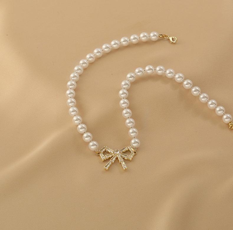Ladies Lux Fake Pearl Bowknot Necklace SKAJ015