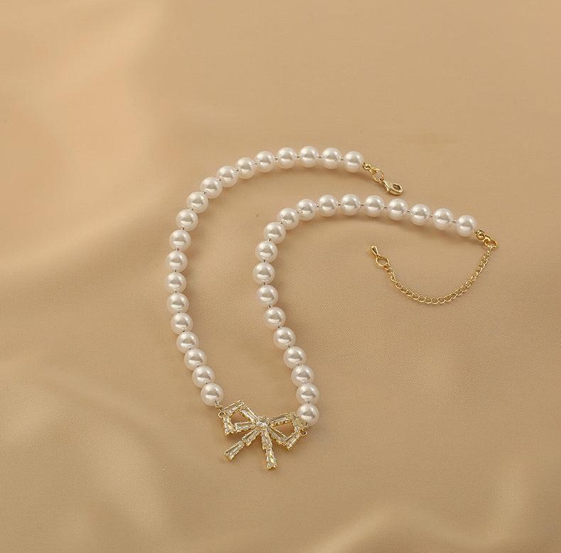 Ladies Lux Fake Pearl Bowknot Necklace SKAJ015