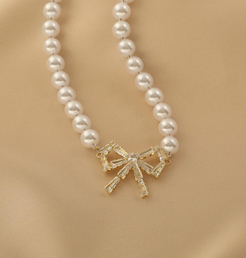 Ladies Lux Fake Pearl Bowknot Necklace SKAJ015