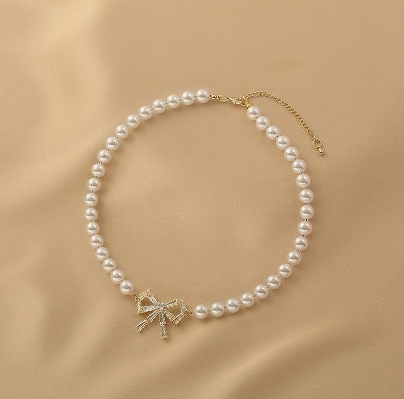 Ladies Lux Fake Pearl Bowknot Necklace SKAJ015